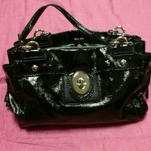 Shiny black coach hand bag