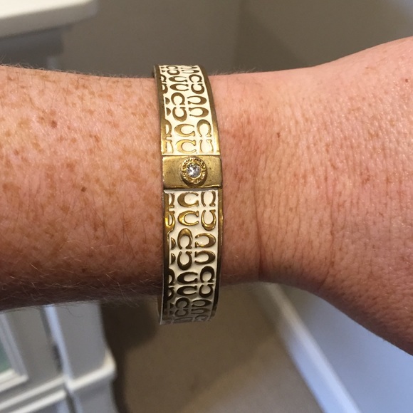 Cute gold and white coach bangle bracelet