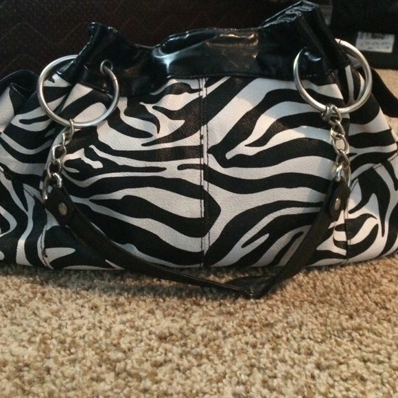 A zebra print purse - Picture 4 of 4