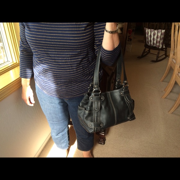 Black leather Tignanello purse.