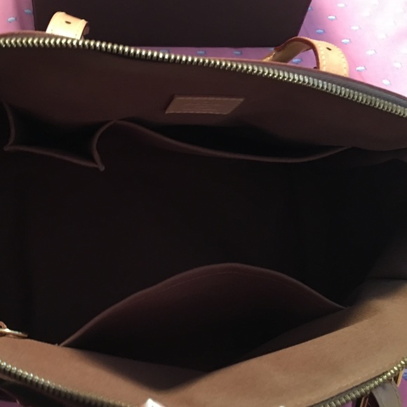 Authentic Louis Vuitton Trivoli GM - Picture 4 of 4