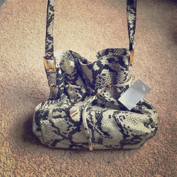 Cache Handbags - Never been used Cache best seller handbag