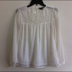 White long sleeve top.