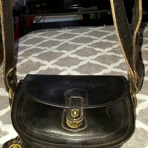 Black all leather Dooney & Bourke shoulder purse