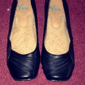 ***SOLD*** Black flats with slight heel. Size 7.