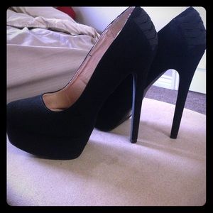 Black suede pumps