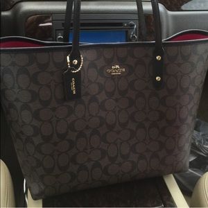coach large city taxi tote