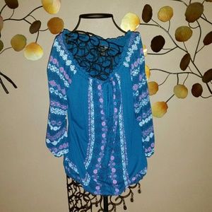 ***SOLD***Bright blue top with floral design