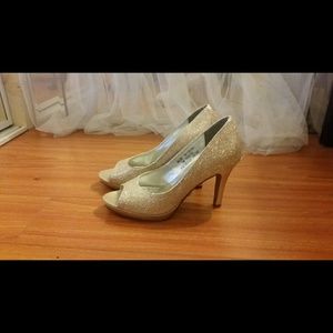 Sparkly champagne peep tie heels