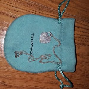 Tiffany small heart necklace with "I love you"