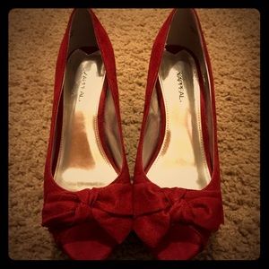 Red peep toe pumps
