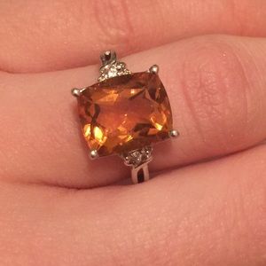 Citrine with two cz's on a silver band size 7