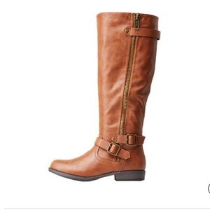 Knee high riding boots. Brand new never worn