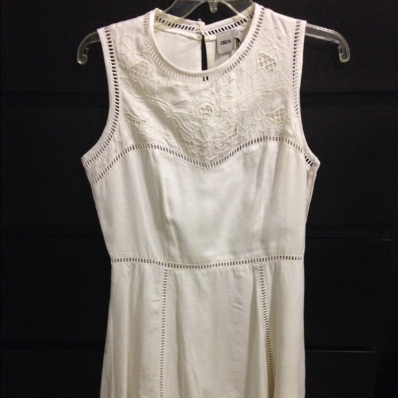 Slightly off white dress with floral design