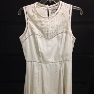 Slightly off white dress with floral design