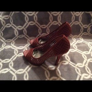 Burnt orange perforated peep toe pumps!