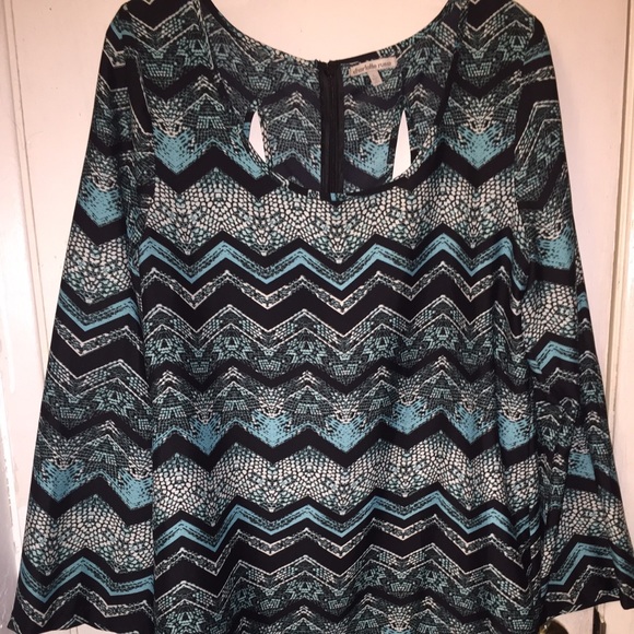 Long sleeve dress. Mid thigh. Not stretchy.