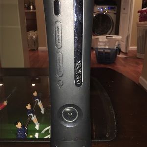 Xbox 360 with 5 games and 2 controllers