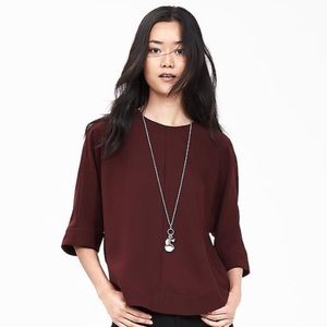 BR MONOGRAM CROSS-BACK DRAPEY TOP
