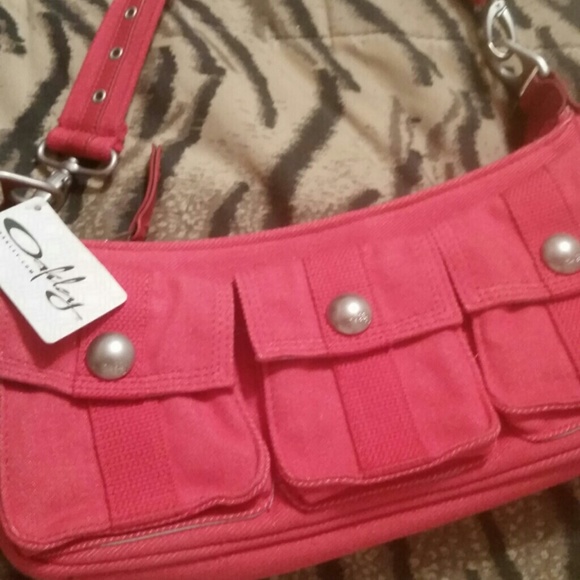 Oakley Handbags - red canvas purse
