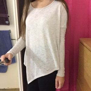 Cream colored asymmetrical legging top