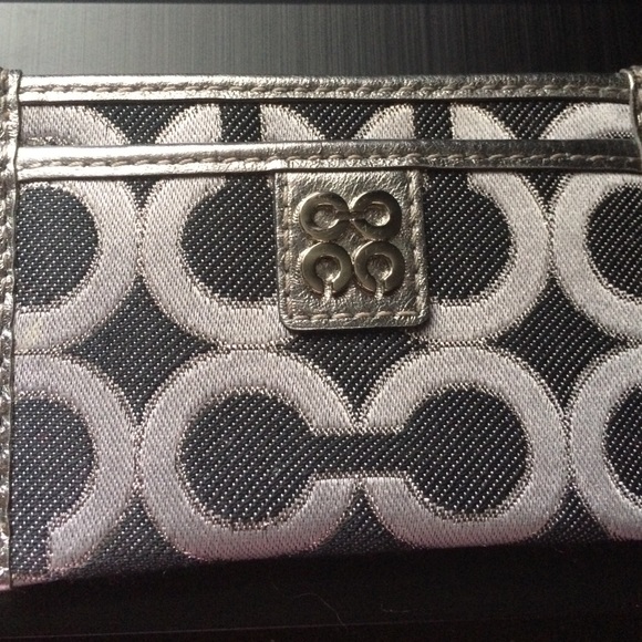 Coach credit card holder.