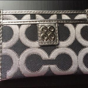 Coach credit card holder.