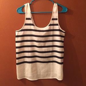 Black and white striped blouse.