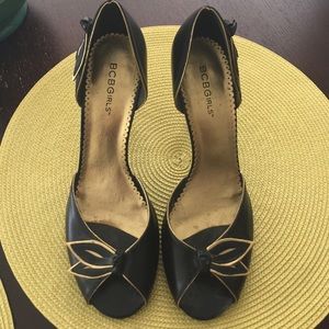 BCBGirl black peep toe high heels with gold trim