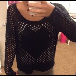 Delia's black sweater with holes