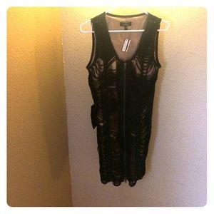 Black leather dress with black strips.