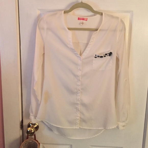 Off white long sleeved chiffon top with a pocket