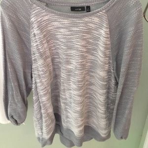 Cute sweatshirt-like top with glittery touch.