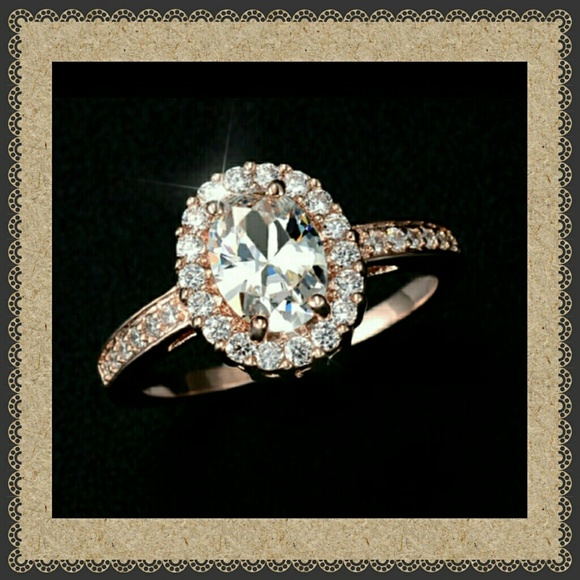 18k rose gold plated ring cz. Size 7