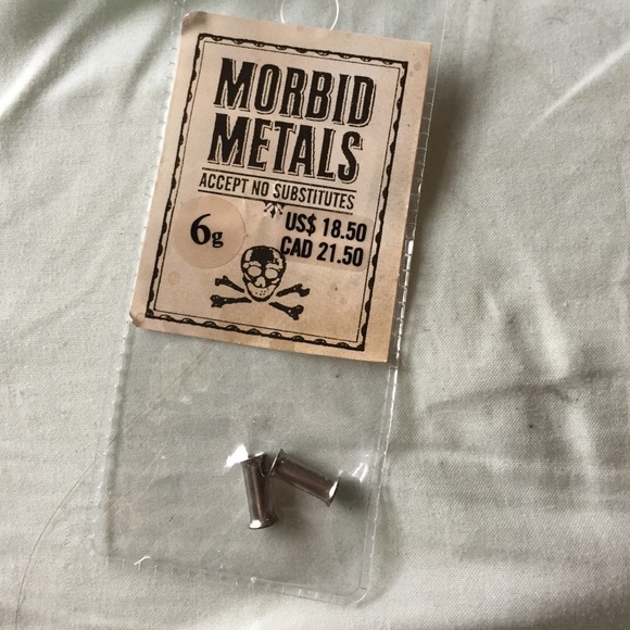 Double flared stainless steel 6g tunnels