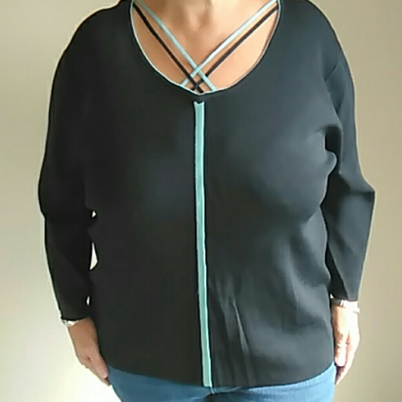 Black sweater with light turquoise