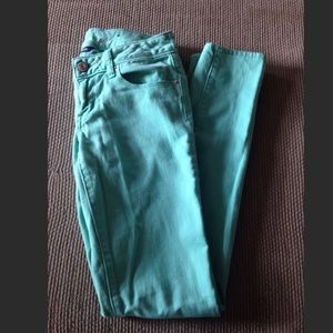 Turquoise skinny jeans