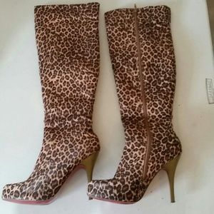 Knee high cheetah print boot