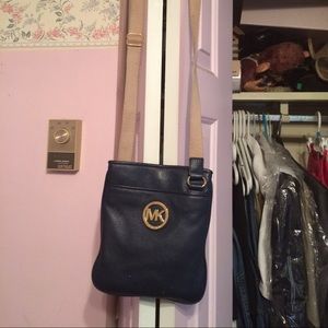 Leather Michael Kors cross body. Color navy