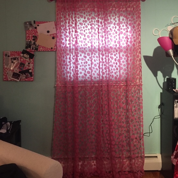 4 Pink polka dot curtains.