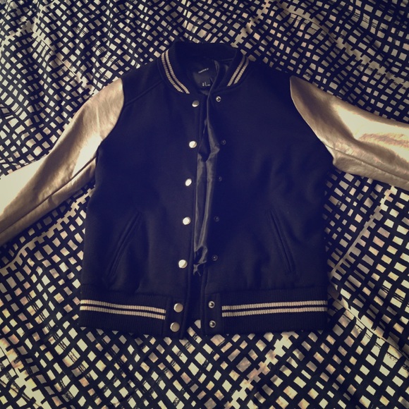 Black and gold varsity jacket