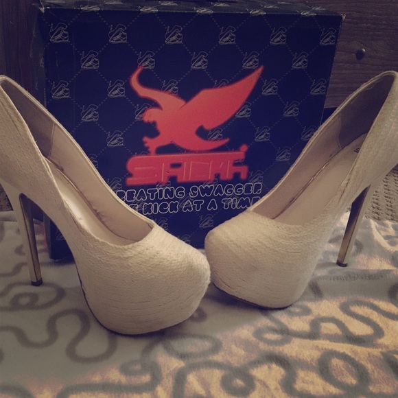 Sheik brand High Heels . The heel is about 6"