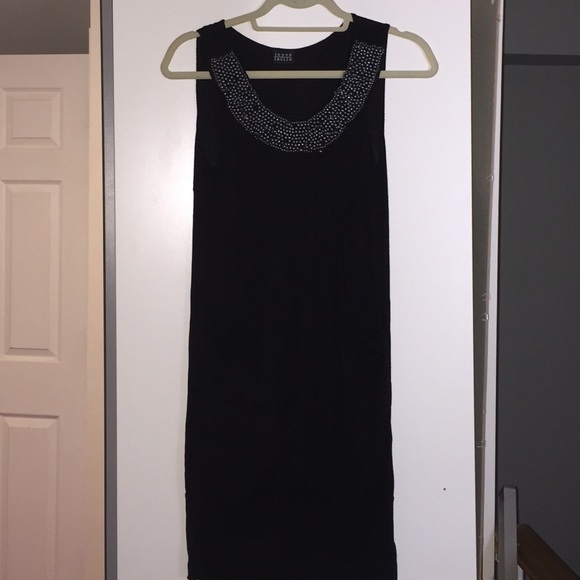 Loose fit black dress with beaded neckline