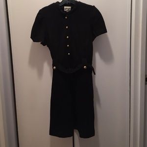 Black dress with gold buttons