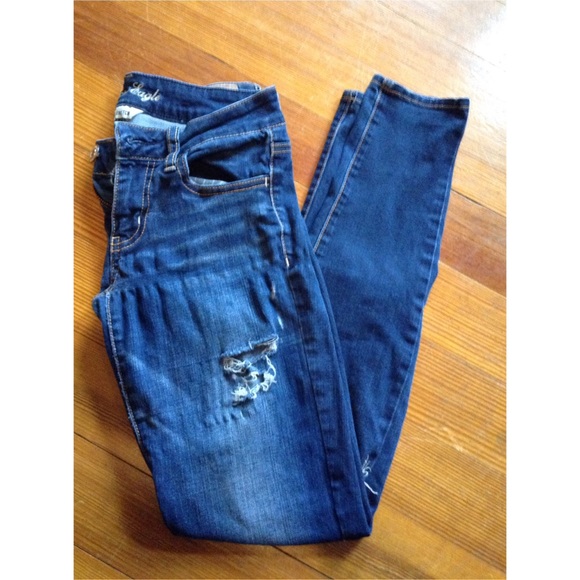 Dark washed ripped skinny jeans