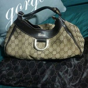 100% Authentic Gucci canvas bag with gold horsebit