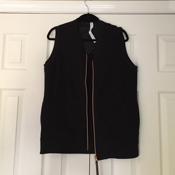 Lululemon black vest with gold zipper.