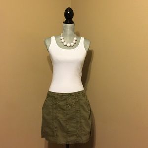 Army green mini skirt.