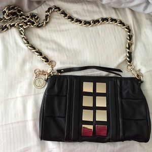 Marciano black leather clutch