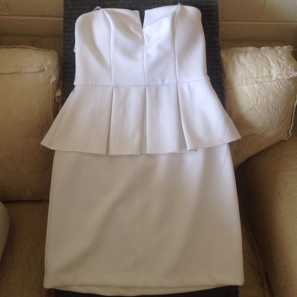 Strapless white peplum cocktail dress